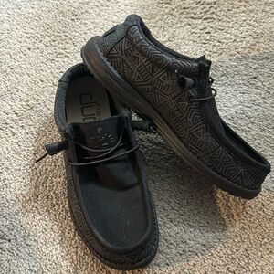 basically brand new wally stretch total black hey dudes size 9